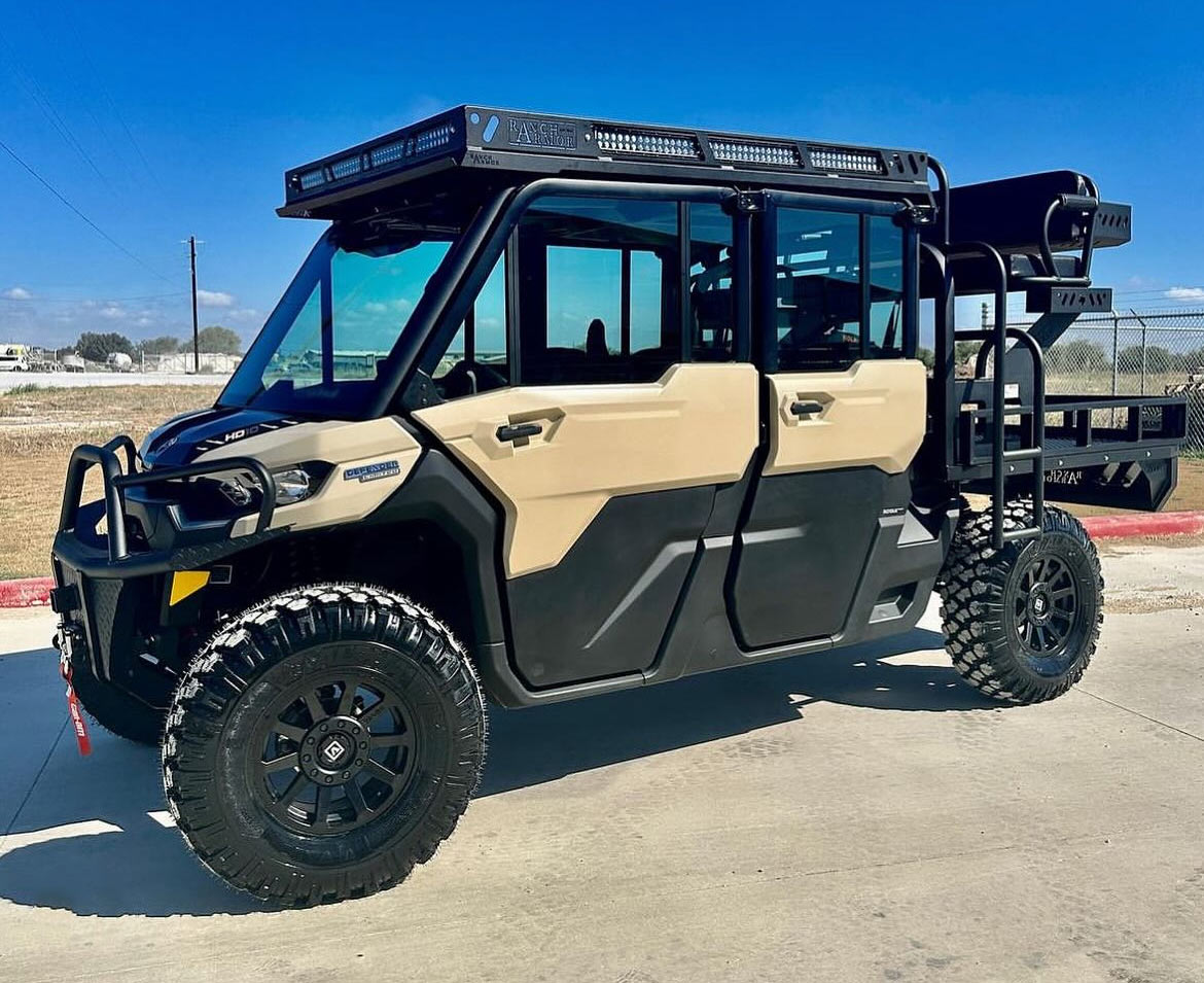 new can-am defender on new wheels and tires overlanding